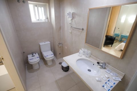 Triple Room, Balcony | Bathroom | Shower, free toiletries, hair dryer, towels