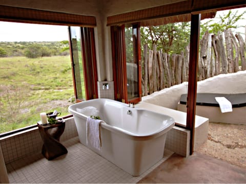 Luxury King Suite | Bathroom | Separate tub and shower, deep soaking tub, rainfall showerhead