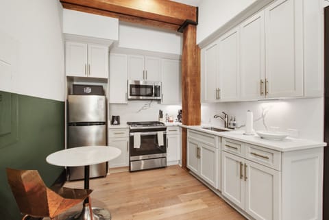 Studio, No Windows | Private kitchen | Full-size fridge, microwave, oven, stovetop