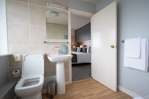 Twin Room, View | Bathroom | Shower, hair dryer, towels