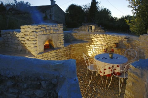 pizza/ bread oven, eating area.