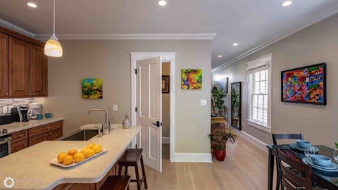 A powder room sits right off the kitchen...