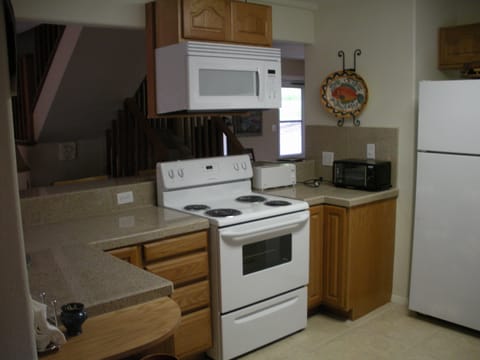 Fully stocked Kitchen with Fridge, Stove, Microwave, Toaster and Coffee Maker