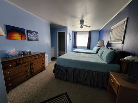 Family Room, 2 Double Beds, Non Smoking, Private Bathroom | Down comforters, iron/ironing board, free WiFi, bed sheets