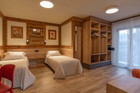 Appartamento Genzianella (100 mt. from the hotel) | Premium bedding, memory foam beds, in-room safe, desk