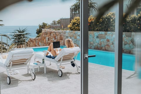 2 outdoor pools, pool umbrellas, sun loungers