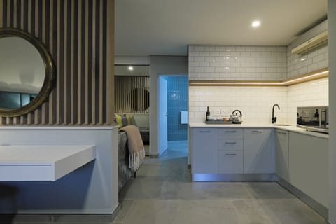 Garden Suite | Private kitchenette | Microwave, coffee/tea maker, electric kettle, highchair