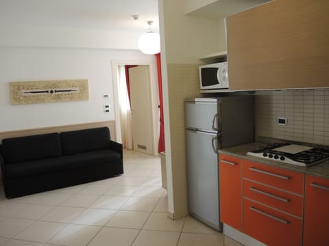 Apartment, 1 Bedroom, Accessible (B2 South 29) | Private kitchen | Full-size fridge, microwave, stovetop, cookware/dishes/utensils