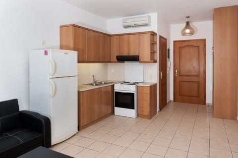 Apartment, 1 Bedroom | Private kitchen | Fridge, stovetop, dishwasher, coffee/tea maker