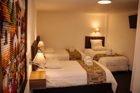 Triple Room | In-room safe, desk, free WiFi, bed sheets