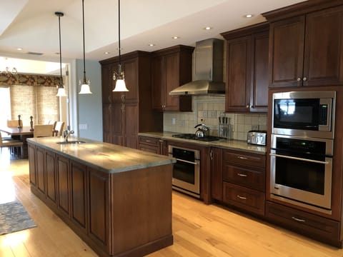 Gas range, double oven and microwave.