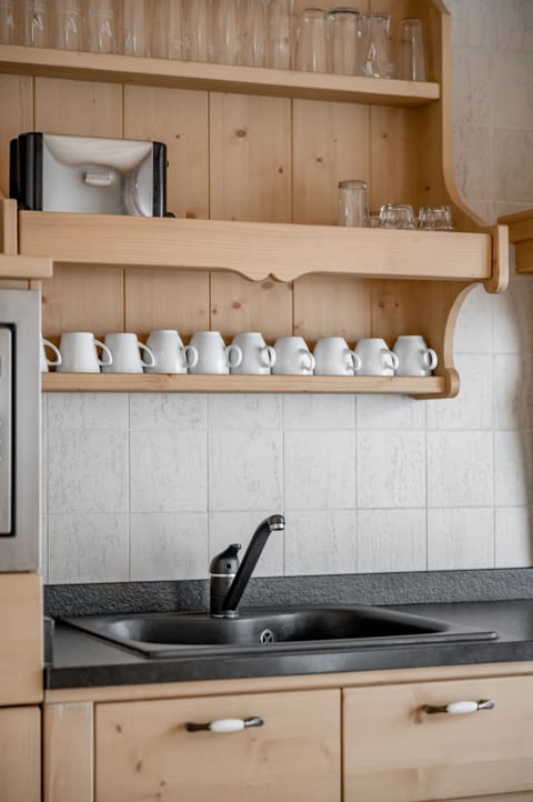 Deluxe Apartment, 2 Bedrooms, Balcony | Private kitchen | Fridge, microwave, stovetop, dishwasher