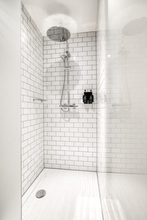 Shower, rainfall showerhead, designer toiletries, hair dryer