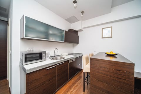 Superior Studio | Private kitchen | Fridge, microwave, stovetop, dishwasher