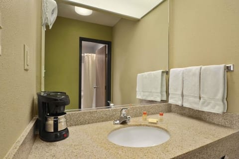 Combined shower/tub, eco-friendly toiletries, hair dryer, towels