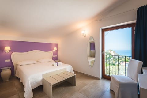 Double Room (Capri) | Minibar, in-room safe, individually decorated, desk