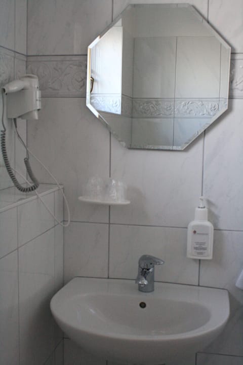 Shower, hair dryer, soap, shampoo