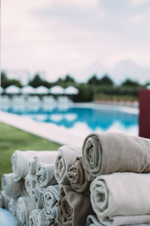 Indoor pool, outdoor pool, pool umbrellas, sun loungers