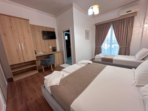 Triple Room, Balcony, Sea View | In-room safe, desk, blackout drapes, free WiFi