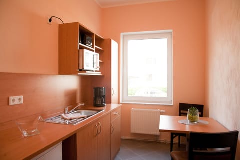 Double Room | Private kitchen | Fridge, microwave, coffee/tea maker, electric kettle