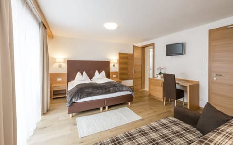 Down comforters, minibar, in-room safe, blackout drapes