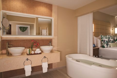 Separate tub and shower, jetted tub, designer toiletries, hair dryer