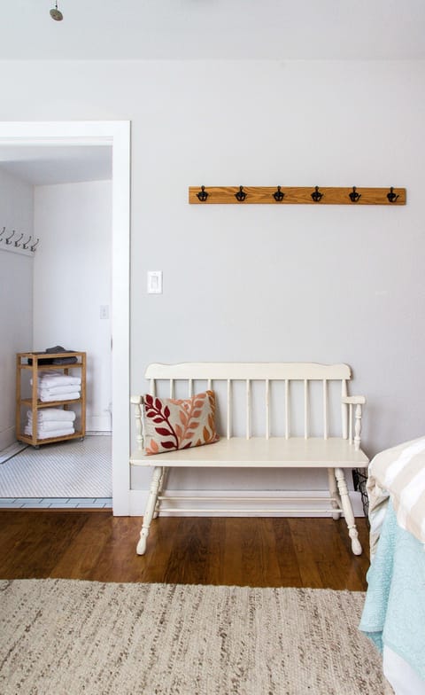 Third bedroom bench and walk through to bathroom