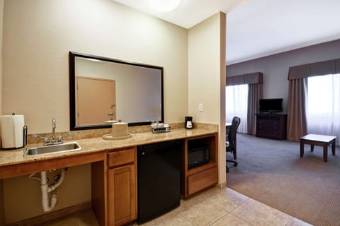 Premium bedding, down comforters, pillowtop beds, in-room safe