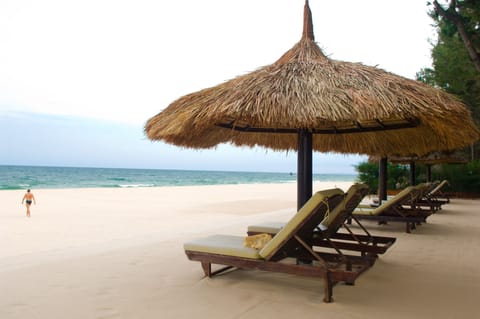 Private beach, white sand, sun loungers, beach umbrellas