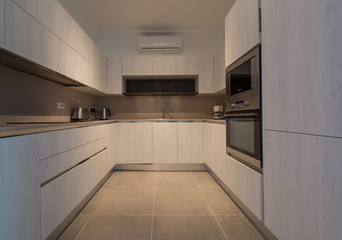 Apartment, 2 Bedrooms | Private kitchen | Full-size fridge, microwave, oven, dishwasher