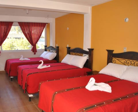 Classic Triple Room, Multiple Beds, Non Smoking | Free WiFi, bed sheets