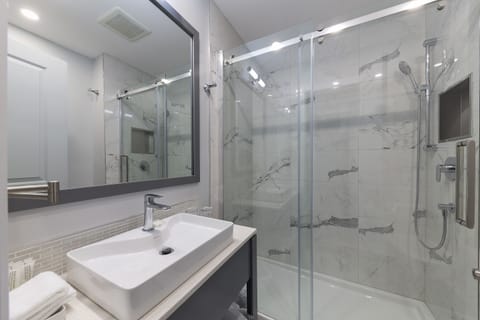 Signature Suite, 1 Queen Bed, Non Smoking | Bathroom | Shower, rainfall showerhead, free toiletries, hair dryer