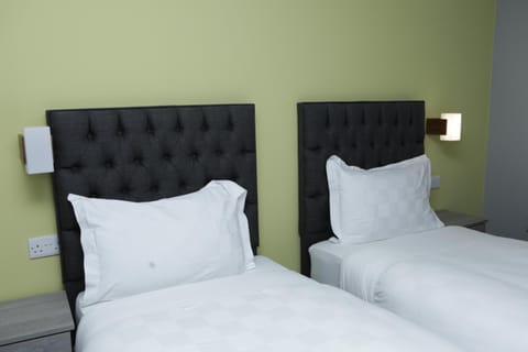 Desk, blackout drapes, soundproofing, iron/ironing board