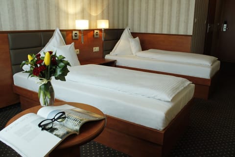 Twin Room | In-room safe, desk, iron/ironing board, rollaway beds