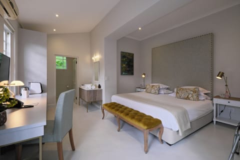 Deluxe Double Room, 1 King Bed, Ground Floor | Premium bedding, in-room safe, individually decorated