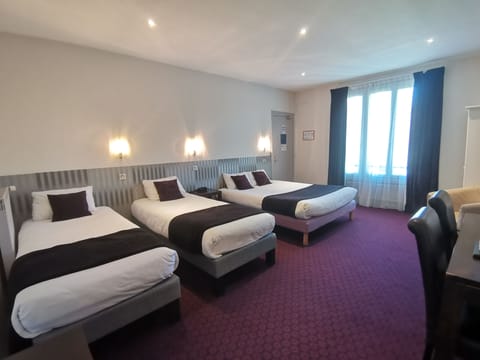 Quadruple Room | Desk, blackout drapes, iron/ironing board, free WiFi