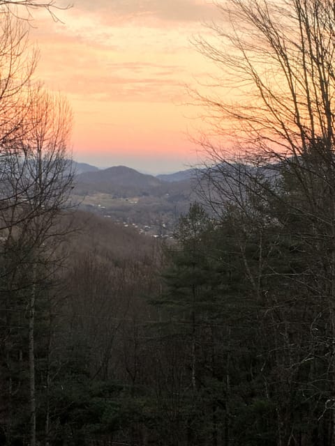 Relax around the fire pit and see the twinkling lights from the city below