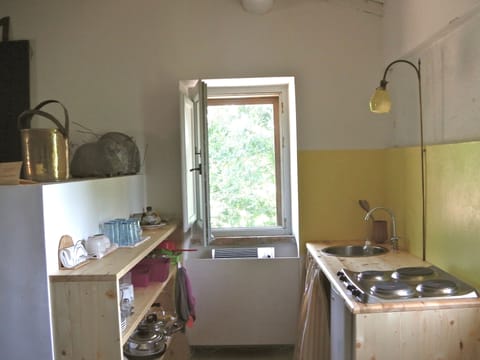 Studio Deluxe | Private kitchen | Full-size fridge, stovetop, electric kettle, toaster