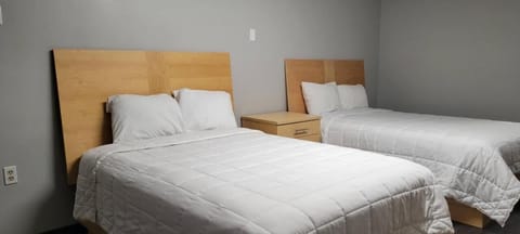 Deluxe Room, 2 Queen Beds | Minibar, desk, iron/ironing board, free WiFi