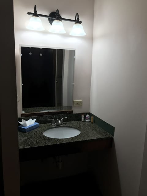 Economy Room, 1 Queen Bed, Accessible, Non Smoking (Ground Floor) | Bathroom | Shower, rainfall showerhead, free toiletries, towels