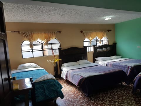 Family Room, Multiple Beds | Blackout drapes, free WiFi, bed sheets