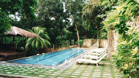 Outdoor pool, open 9:00 AM to 10:00 PM, sun loungers