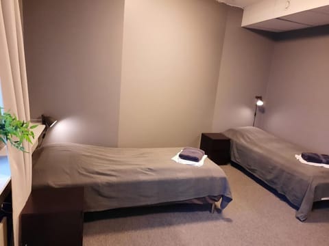 Twin Room, Shared Bathroom | Blackout drapes, iron/ironing board, free WiFi, bed sheets