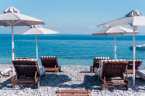 On the beach, free beach cabanas, sun loungers, beach umbrellas