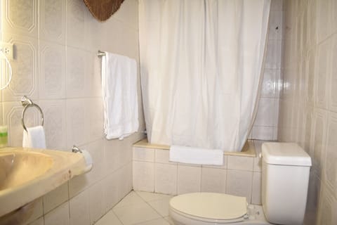 Basic Single Room, Non Smoking | Bathroom shower