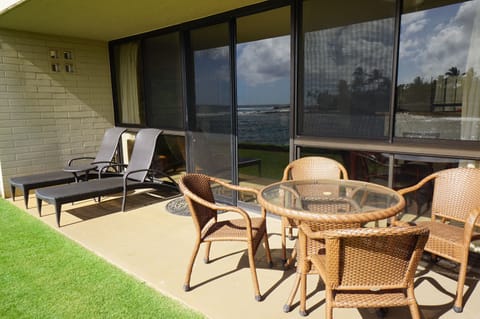 View from the grass looking at the expansive lanai - largest layout in complex!