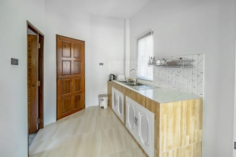 Standard Villa, 1 Bedroom | Private kitchenette | Fridge, stovetop, electric kettle, cookware/dishes/utensils