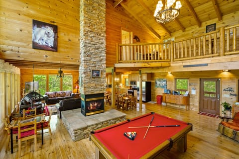 Spacious great room with dining for 12, domino table, pool table, and much more