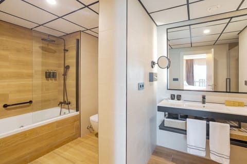 The Level Grand Premium Room | Bathroom | Designer toiletries, hair dryer, bathrobes, slippers
