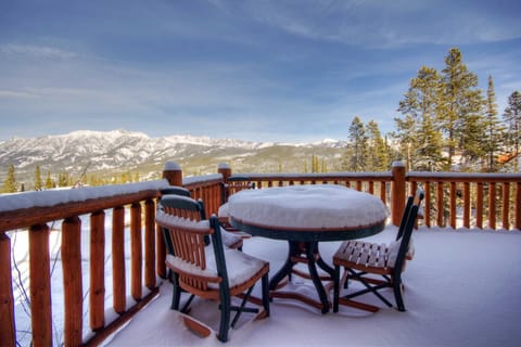 Plenty of outdoor seating on wrap around deck off of living/dining room.